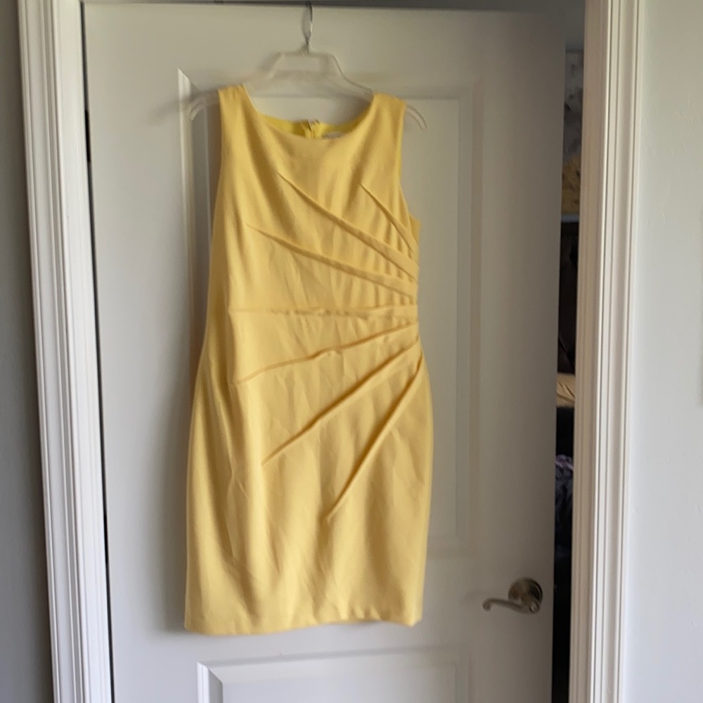Brand new Calvin Klein sunburst dress